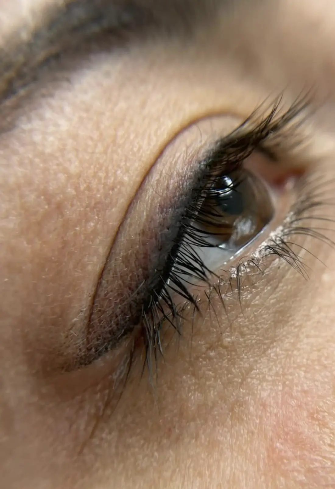 winged eyeliner tattoo